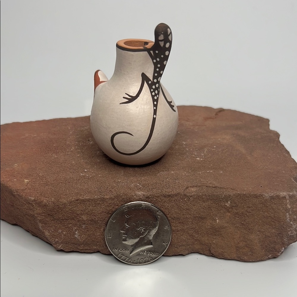 Handcrafted pottery with Frog and Lizard Designs.